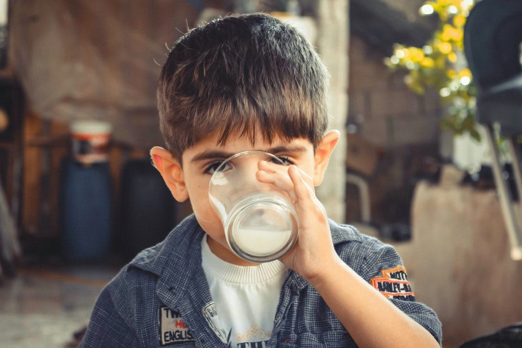 photo-of-boy-drinking-glass-of-milk-1210005
